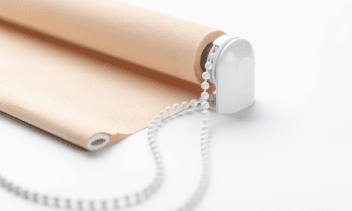 Roller blind with plastic parts.
